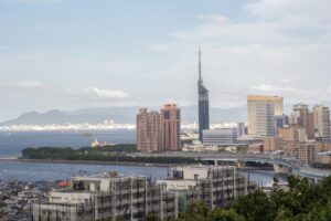 city skyline near body of water during daytime